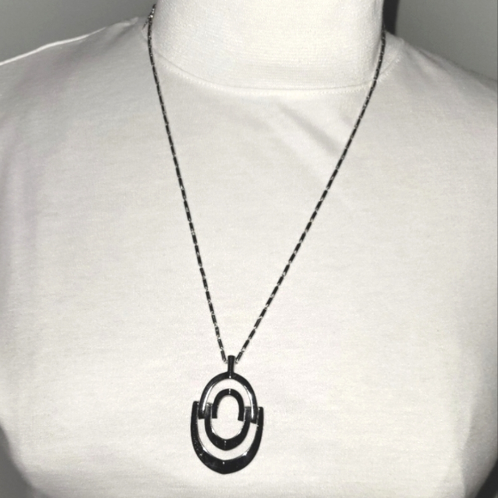 60s Trifari silver hinged pendant on a dainty bar chain necklace